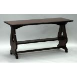 EARLY TWENTIETH CENTURY MAHOGANY CENTRE TABLE, the moulded oblong top, raised on heavy end