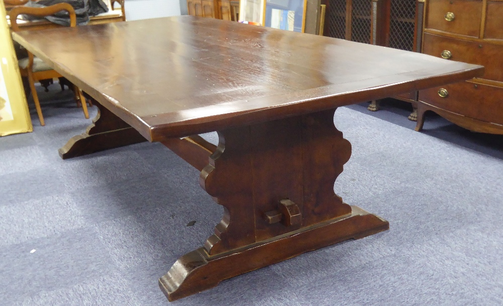 LARGE TWENTIETH CENTURY DARK STAINED OAK REFECTORY TABLE, with thick plank top raised on shaped - Image 2 of 2