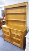 LIGHT OAK WELSH DRESSER WITH TWO TIER RAISED PLATE RACK, the base with two drawers with arcade panel