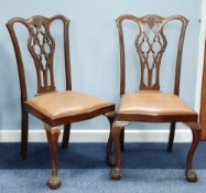 PAIR OF CHIPPENDALE STYLE MAHOGANY SINGLE CHAIRS with carved and interlaced splat backs, drop-in