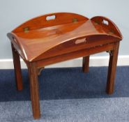 EARLY 19th CENTURY MAHOGANY BUTLER'S TRAY with hinged fold-down sides forming a flat oval, on a