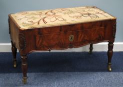 EARLY 19th CENTURY CARVED AND FIGURED MAHOGANY DUET STOOL the upholstered oblong top covered in fawn