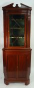 EDWARDIAN LINE INLAID MAHOGANY TWO PART FLOOR STANDING CORNER CUPBOARD, the break arch pediment