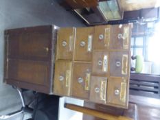 VICTORIAN OAK TWO DRAWER FILING CABINET, A SET OF 10 OAK PHARMACY DRAWERS, A DESK FILING STAND AND A