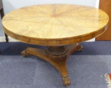 WILLIAM IV MAHOGANY CIRCULAR BREAKFAST TABLE the removable top having matched radiating figured