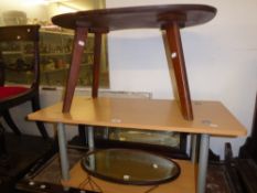 A FRAMED OVAL BEVELLED EDGE WALL MIRROR AND TWO COFFEE TABLES