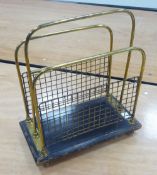 VICTORIAN TUBULAR BRASS AND MESH SIDED PERIODICAL RACK, on ebonised oblong base with brass pad feet,