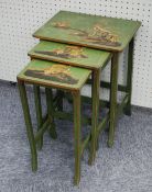 GREEN LACQUERED NEST OF TABLES, with chinoiserie decoration, on fluted supports