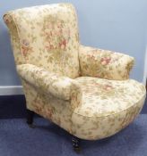 PROBABLY HOWARD, VICTORIAN DEEP SEATED EASY ARMCHAIR all upholstered and covered in cream and floral