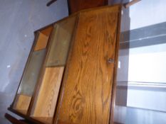 A SMALL OAK BUREAU, WITH GLASS SLIDING DOORS BELOW DROP-FRONT AND A SMALL DROP-LEAF OCCASIONAL TABLE