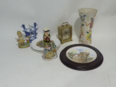 A BRASS CARRIAGE CLOCK, AN ARTHUR WOOD TRUMPET VASE, FIGURINES ETC....