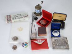 AN EARLY TWENTIETH CENTURY WHITE METAL CANDLE LIGHTER AND EXTINGUISHER COMBINING MATCH CASE
