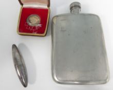 A LARGE ENGINE TURNED CURVED OBLONG SPIRIT FLASK, with screw off lid, 6 1/4" high, A LADY'S SILVER