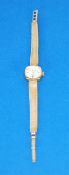 LADY'S SEKONDA 9ct GOLD WRIST WATCH, with 17 jewel movement, small circular silvered dial with