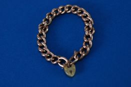 VICTORIAN 9ct GOLD BRACELET with hollow curb pattern links and 9ct gold padlock clasp, 19gms