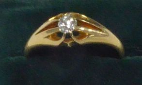 a VICTORIAN 18ct GOLD RING, set with an old cut oval diamond, hallmarked Birmingham 1897, approx 1/