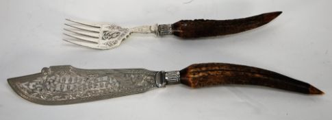 PAIR OF VICTORIAN FISH SERVERS, with ornate pierced and engraved blades, natural buckhorn point