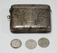 EDWARDIAN SILVER VESTA BOX, oblong and hollowed with foliate scroll engraved decoration with