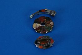 THREE SCOTTISH PEBBLE AND CAIRNGORM SET WHITE METAL BROOCHES (3)