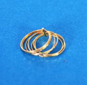 MIDDLE EASTERN GOLD COLOURED METAL MULTI BAND RING comprising; nine narrow bands within a sliding