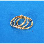 MIDDLE EASTERN GOLD COLOURED METAL MULTI BAND RING comprising; nine narrow bands within a sliding