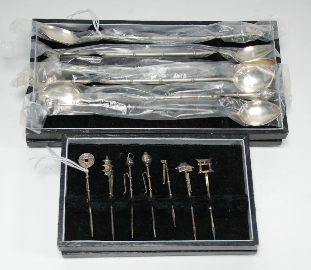 SET OF SIX FAR EASTERN ICE CREAM SPOONS, marked 'Sterling', the long bamboo pattern handles having