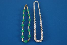 A GILT METAL AND GREEN HARDSTONE BEAD NECKLACE, TOGETHER WITH A 'Sterling' silver braided