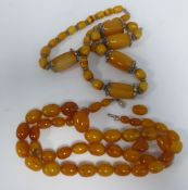 STRAND NECKLACE OF FORTY TWO GRADUATED AMBER BEADS, 10mm-20mm approx 29" (73.7cm) long, 68g gross (