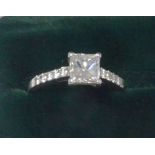 PLATINUM RING, set with a princess cut square diamond, weighing 1.01ct, in a four claw setting,