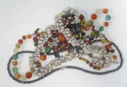 NECKLACE OF VARIOUS HARDSTONE BEADS with crystal spacers; shell necklace; long necklace of coral,