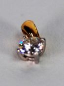 AN 18ct GOLD SMALL PENDANT set with a round brilliant cut solitaire diamond, approx .40ct, approx