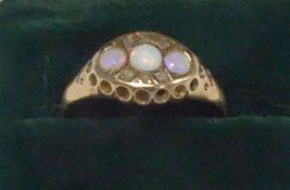 9ct GOLD RING, with an oval setting of three opals and six tiny diamonds, Chester 1915, 1.9gms, ring