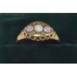9ct GOLD RING, with an oval setting of three opals and six tiny diamonds, Chester 1915, 1.9gms, ring
