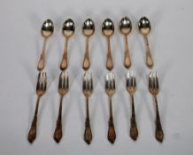 SIX CONTINENTAL 800 MARK SILVER CAKE FORKS AND MATCHING SMALL SPOONS, with pointed and scroll