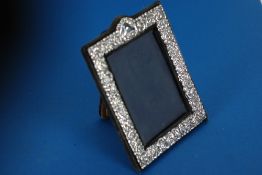 MODERN EMBOSSED BRITANNIA STANDARD SILVER FRONTED PHOTOGRAPH FRAME, with blue plush covered easel