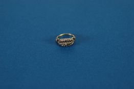 VICTORIAN GOLD AND DIAMOND RING, the top set with an oval of twenty small old cut diamonds and