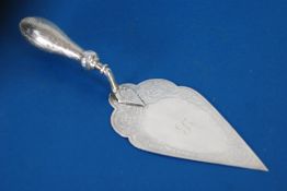 VICTORIAN SILVER CAKE SERVER OF TROWEL PATTERN, having Gothic scroll/strapwork engraved decoration