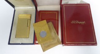 CARAN D'ACHE, GENEVE, SWISS GOLD PLATED PATENT POCKET CIGARETTE LIGHTER, in reeded book shape