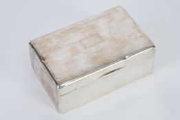 GEORGE V ENGINE TURNED SILVER CLAD TABLE CIGARETTE CASE, by Walker and Hall, of typical form, 2 1/4"