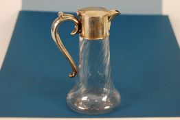 EDWARD VII SILVER MOUNTED MOULDED GLASS CLARET JUG, of spreading cylindrical form with moulded