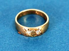 9ct GOLD RING, gypsy set with two small diamonds, approx .20ct in total, 2.6gms, ring size 'i'