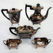 GEORGIAN STYLE ELECTROPLATE TEA SET OF FOUR PIECES OBLONG with cut away corners and scroll feet