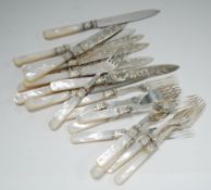 TEN PAIRS OF EARLY TWENTIETH CENTURY ELECTROPLATE DESSERT KNIVES AND FORKS, with mother o'pearl