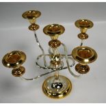 MODERN GEORGIAN STYLE GILT METAL AND ELECTROPLATE FIVE LIGHT CANDELABRUM, with four reflex scroll