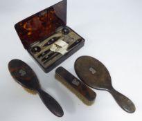 DREW AND SONS, PICCADILLY CIRCUS MANICURE SET, incomplete, in a tortoiseshell case with silver