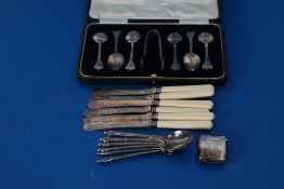 GEORGE V CASED SET OF SIX TEASPOONS AND A PAIR OF SUGAR TONGS by Henry Wilkinson of trefoil form,