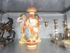 A PAIR OF EARLY 1900's GERMAN PORCELAIN FIGURES, ALSO A POOR QUALITY JAPANESE EARTHENWARE VASE (3)