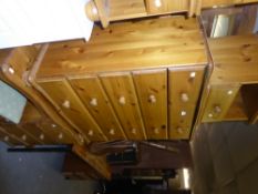 20th CENTURY PINE BEDROOM SUITE COMPRISING A CHEST OF DRAWERS, DRESSING TABLE WITH SWING MIRROR,