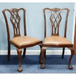 PAIR OF CHIPPENDALE STYLE MAHOGANY SINGLE CHAIRS with carved and interlaced splat backs, drop-in