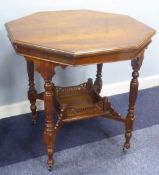 EDWARDIAN WALNUT OCTAGONAL CENTRE TABLE on turned and fluted baluster legs with saltire stretcher